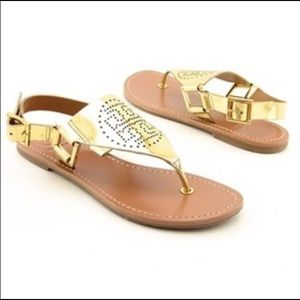 Tory Burch gold flat sandals - size 7