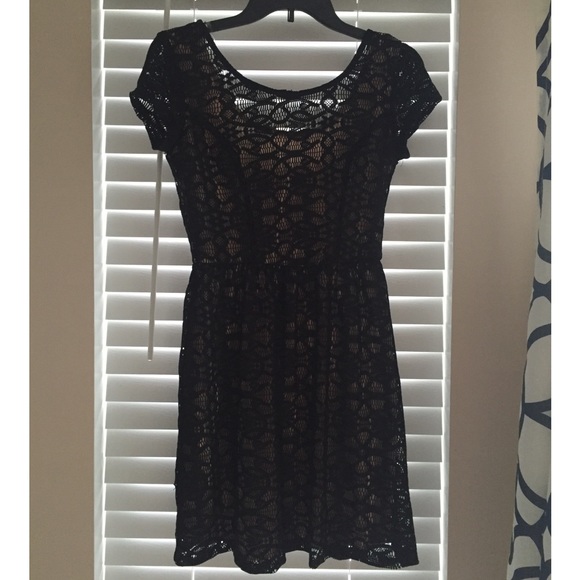 Black all over lace dress with nude lining!