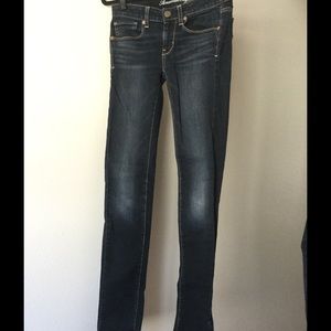 American Eagle dark wash skinny jeans.