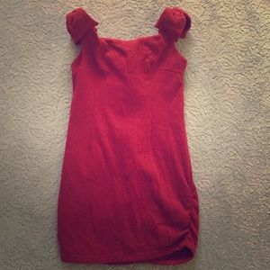 red dress with bow details in shoulder