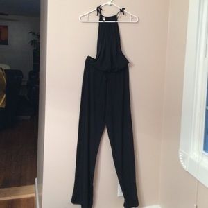 Adorable jumpsuit. Never worn.