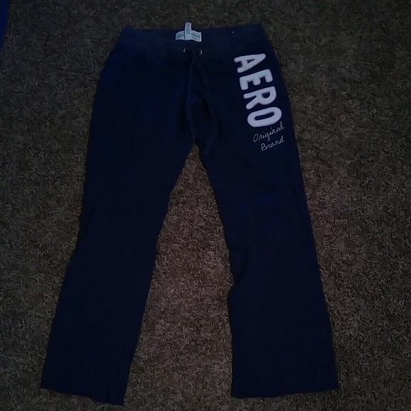 Navy blue with purple and white letters