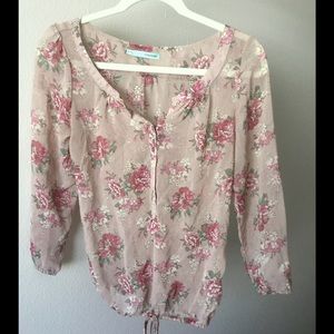 Sheer floral print peasant shirt.