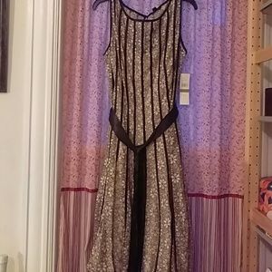 Tags on: Cream and Black Lace dress
