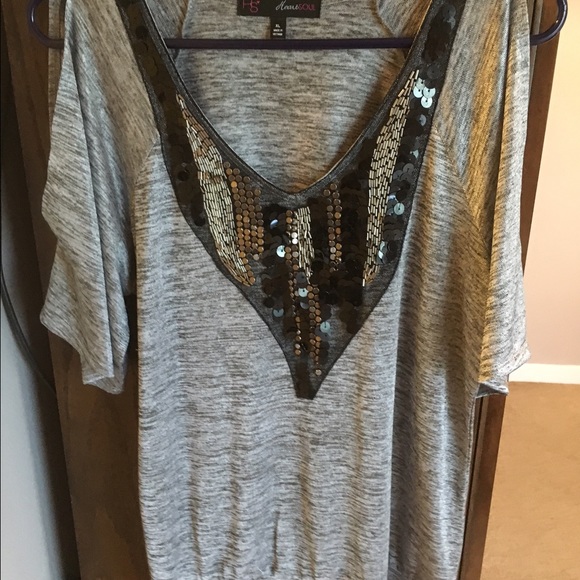 Cold shoulder women's blouse. Bead and sequins.