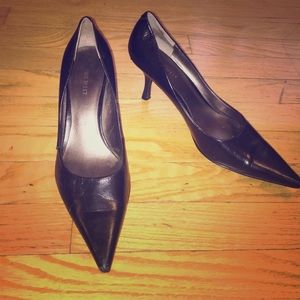 Nine West black pointy toe heels.