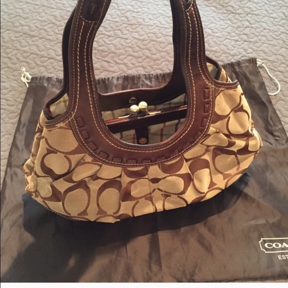 On sale this week! Coach leather and C print purse