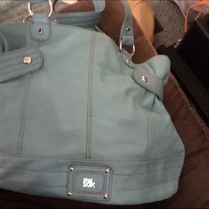 The Sak blue leather purse