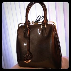 Chocolate color bag with gold hardware