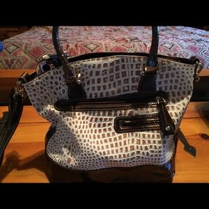 MC blingy purse. Like new! No blemishes or rips.