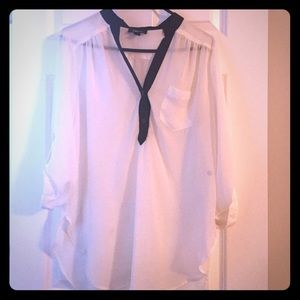 White blouse too with black trim