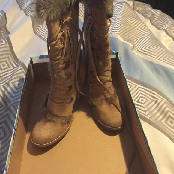 Tan furry boots