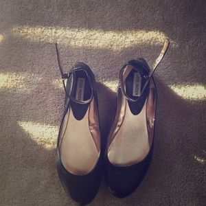 Black flats with ankle straps