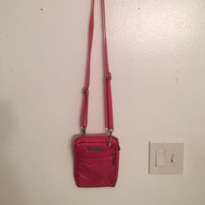 Hot pink mini baggallini purse