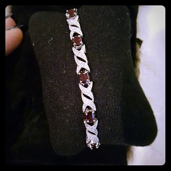 Sterling silver and garnet tennis bracelet