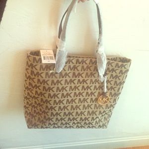 Brand new, unused,classic Michael Kors tote purse.