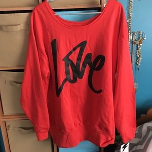 big oversized "love" sweater. new with tags !