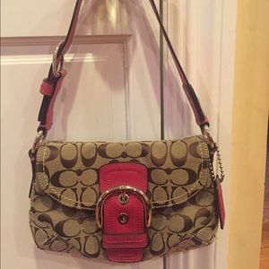 Coach bag with pink accents