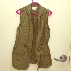 Army green utility vest with studded accents