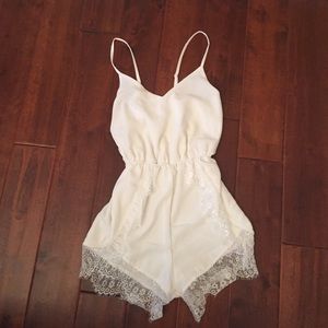 Beautiful elegant white lace romper.