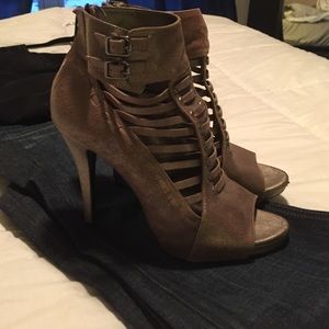 Antiqued silver peep toe ankle booties.