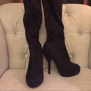 Over the knee black heeled boots