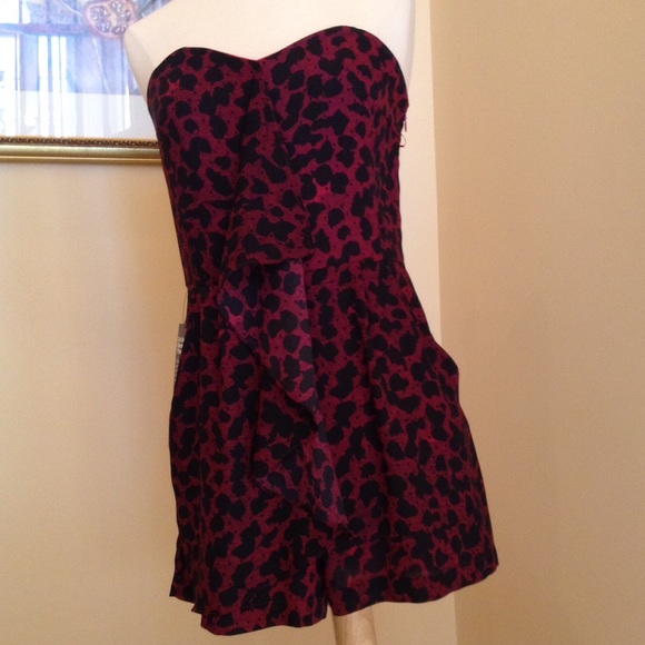Express Dresses & Skirts - Ruffle Front Leopard Print Pnk/Blk Romper NWT