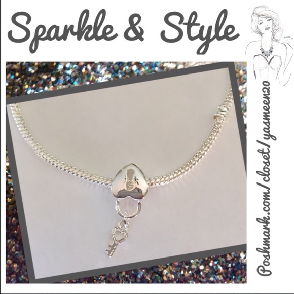 Silver plated heart and key charm