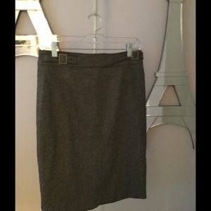 Ann Taylor pencil skirts with buckle.