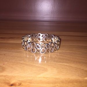 Gold and silver bracket