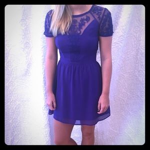Blue cocktail dress with lace detail