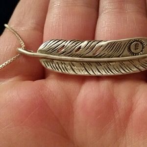 Sterling silver feather pendant and 24 inch chain