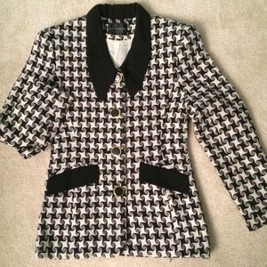 Black and white checker pattern tweed jacket.