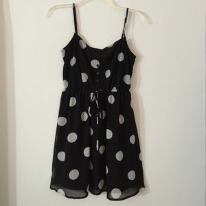 black dress with gray polkadots