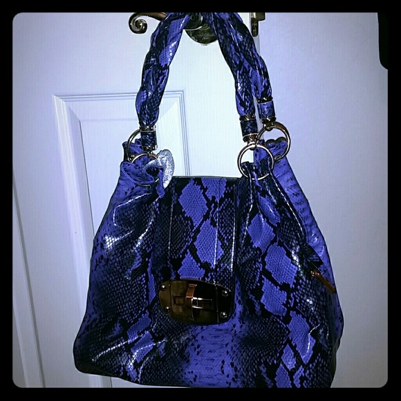 Purple and black/gold handbag