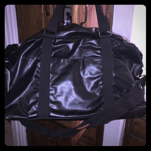 Urban Outfitters faux leather carry on bag