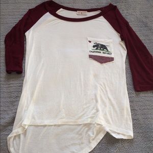 Cream and maroon colored baseball tee