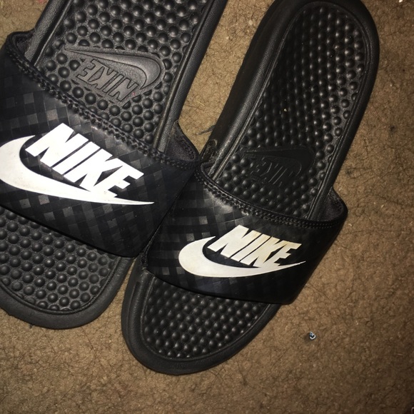 Nike slides.