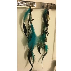 Long feather and chain earrings