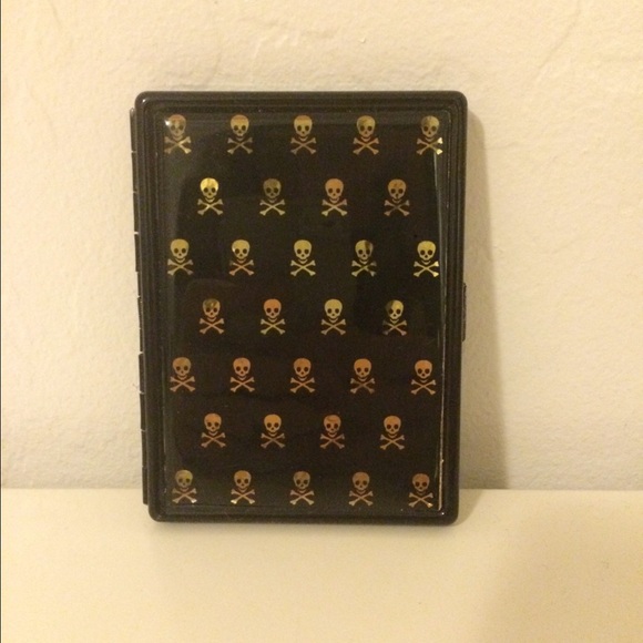 gold and black skull card/gum holder