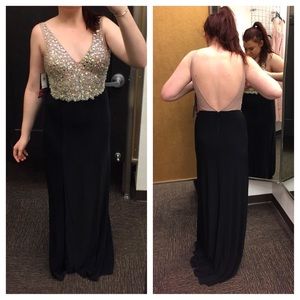 Black and mesh prom dress with open back