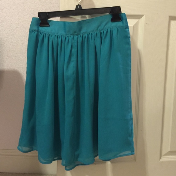 Blue skater skirt with zipper on the side