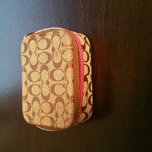 Coach pill or contact lens holder