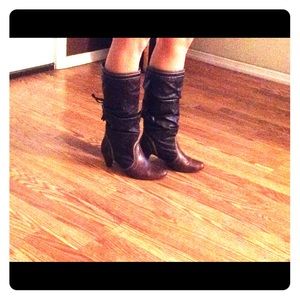 Steve Madden brown stress look boots.