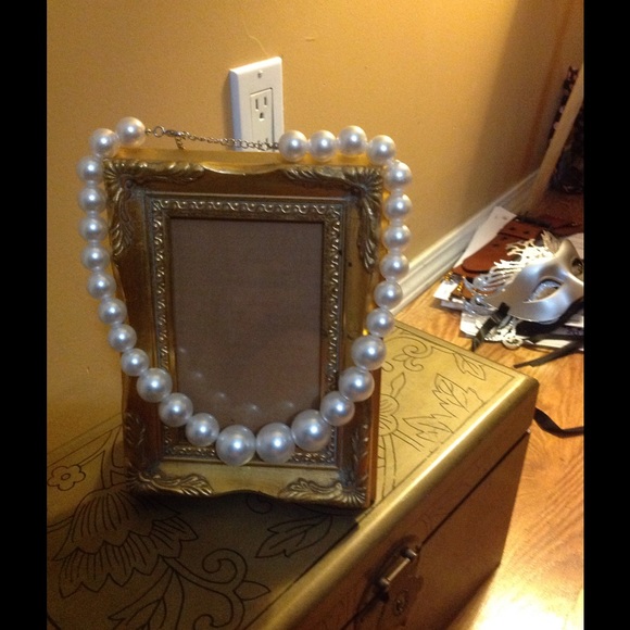White pearl necklace.