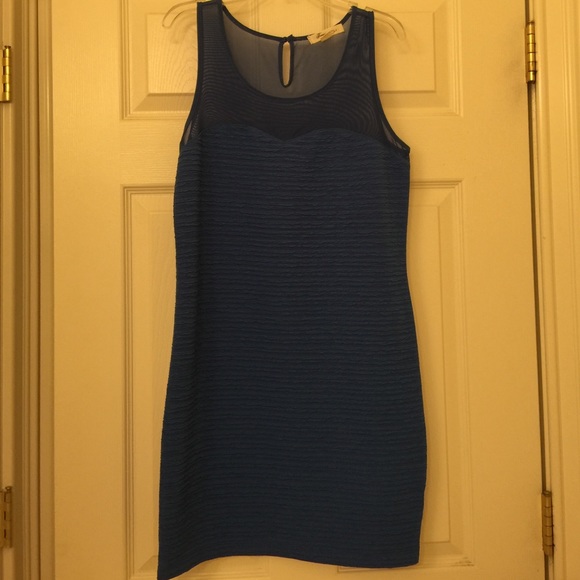 Blue bodycon dress with mesh at the neck
