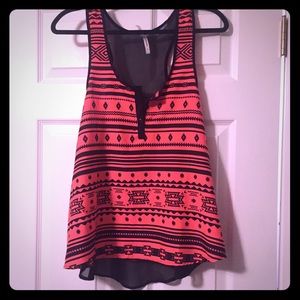 Adorable coral/orange tank with sheer back.