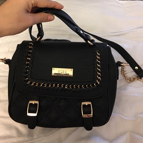 New BCBG black and gold purse