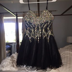 Brand new homecoming/prom dress. Worn once.
