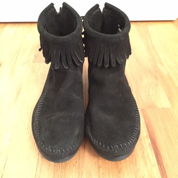 Black Minnetonka ankle booties with fringe
